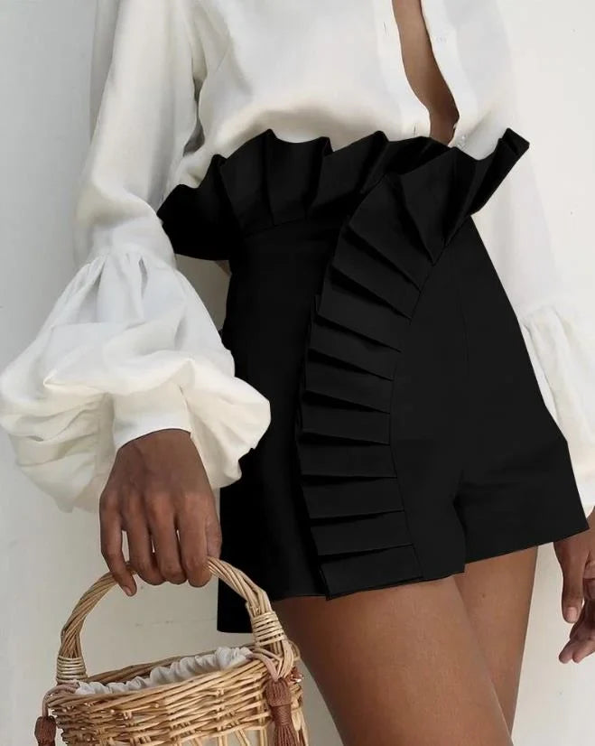Aria pleated high-waist shorts with cascading ruffles, sculpted silhouette, soft breathable fabric