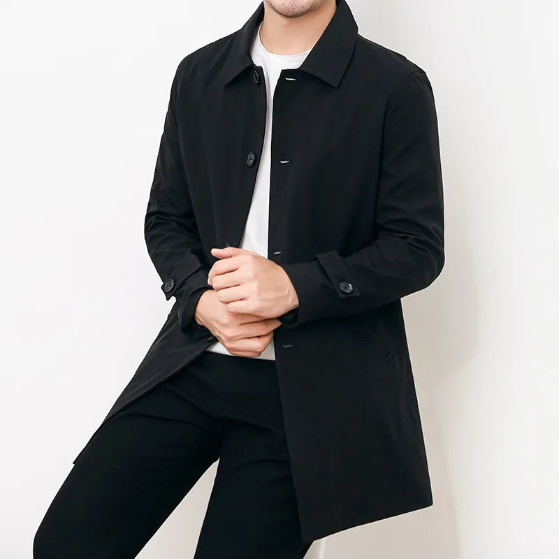 Men's navy blue relaxed fit mid-length windbreaker jacket with button closure water-repellent cotton