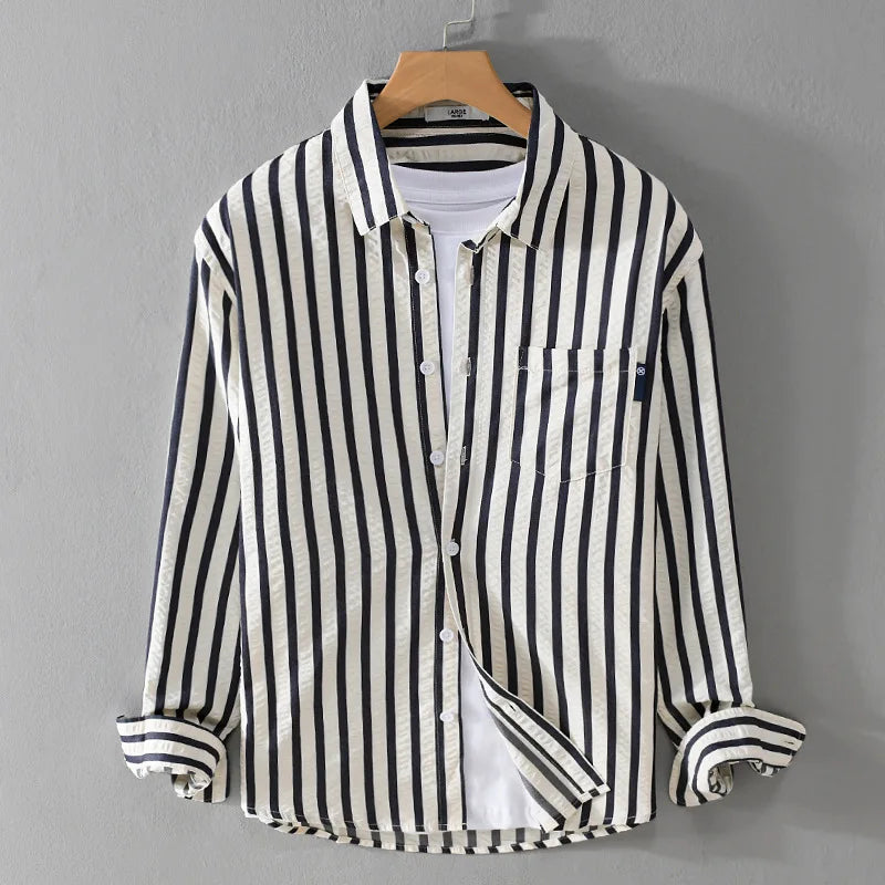 Men's blue striped long sleeve casual dress shirt with chest pocket and button closure