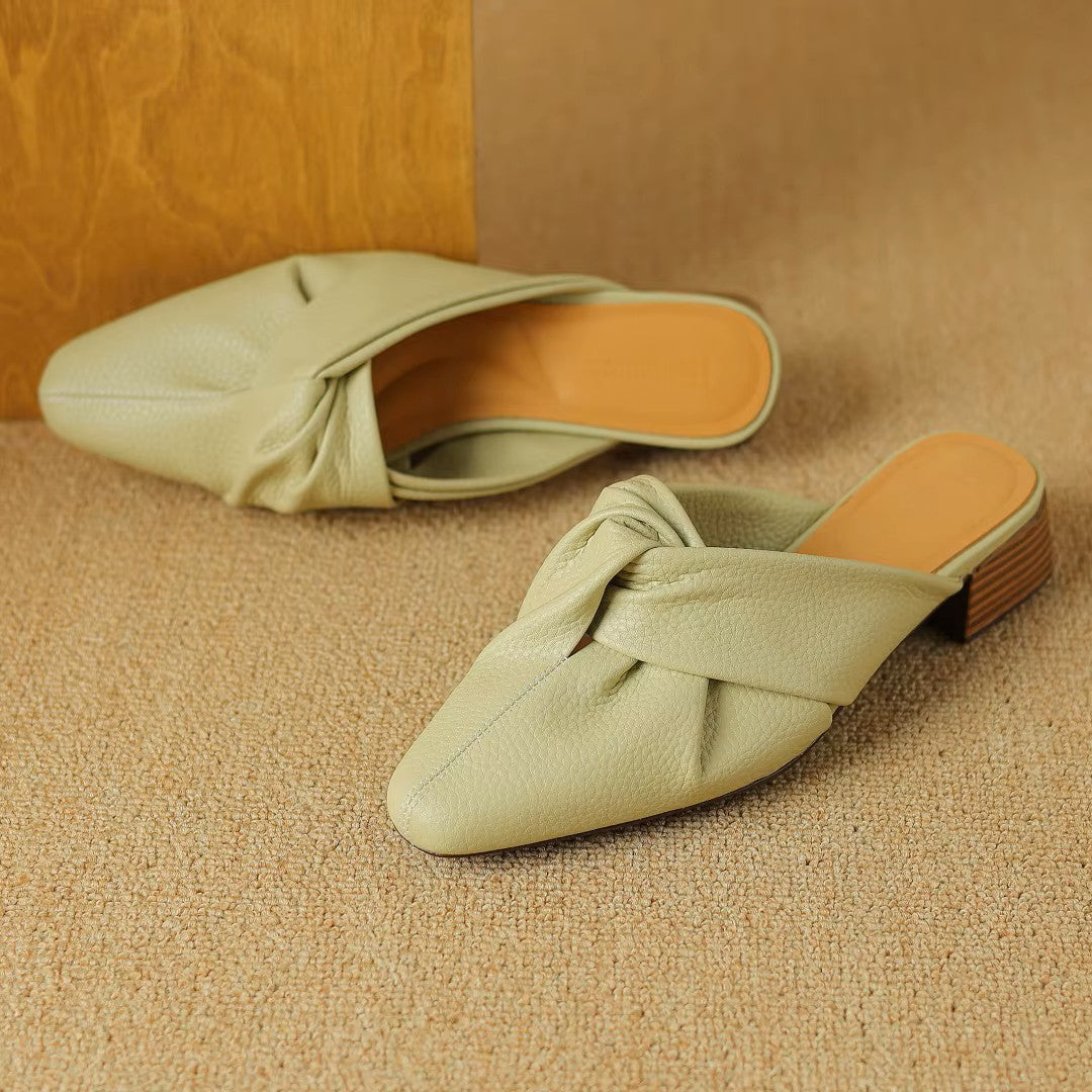 Genuine leather mules with bow-knot detail, textured finish, slip-on style, elegant and comfortable everyday footwear