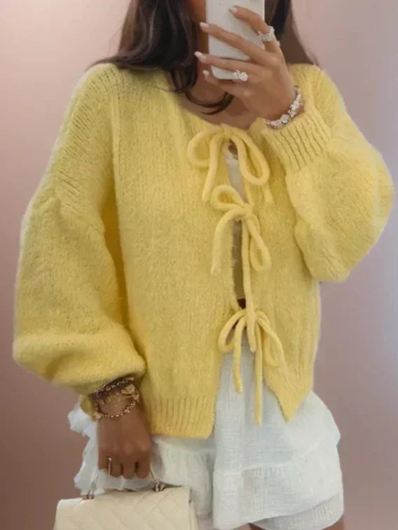 Women's chunky knit cardigan in cozy winter tones with knotted front tie detail for layered style