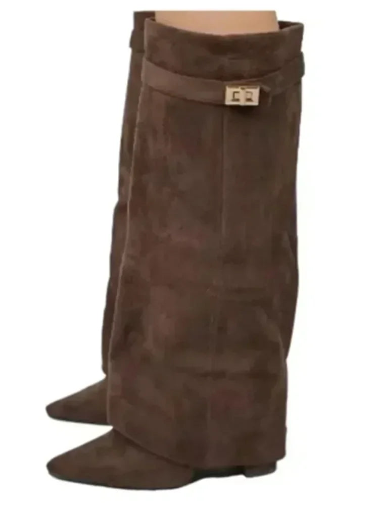 Women's black leather thigh-high boots with sculptural buckle detail, slim silhouette, sizes 2–11