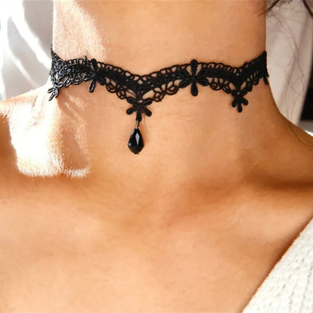 Wednesday Gothic black lace choker necklace with heart-shaped pendant and pearl accents, adjustable fit