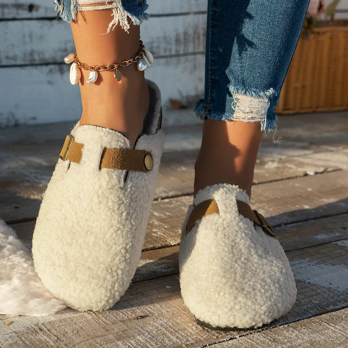 Women's cozy slip-on slippers with plush soft interior lining for warm indoor winter comfort