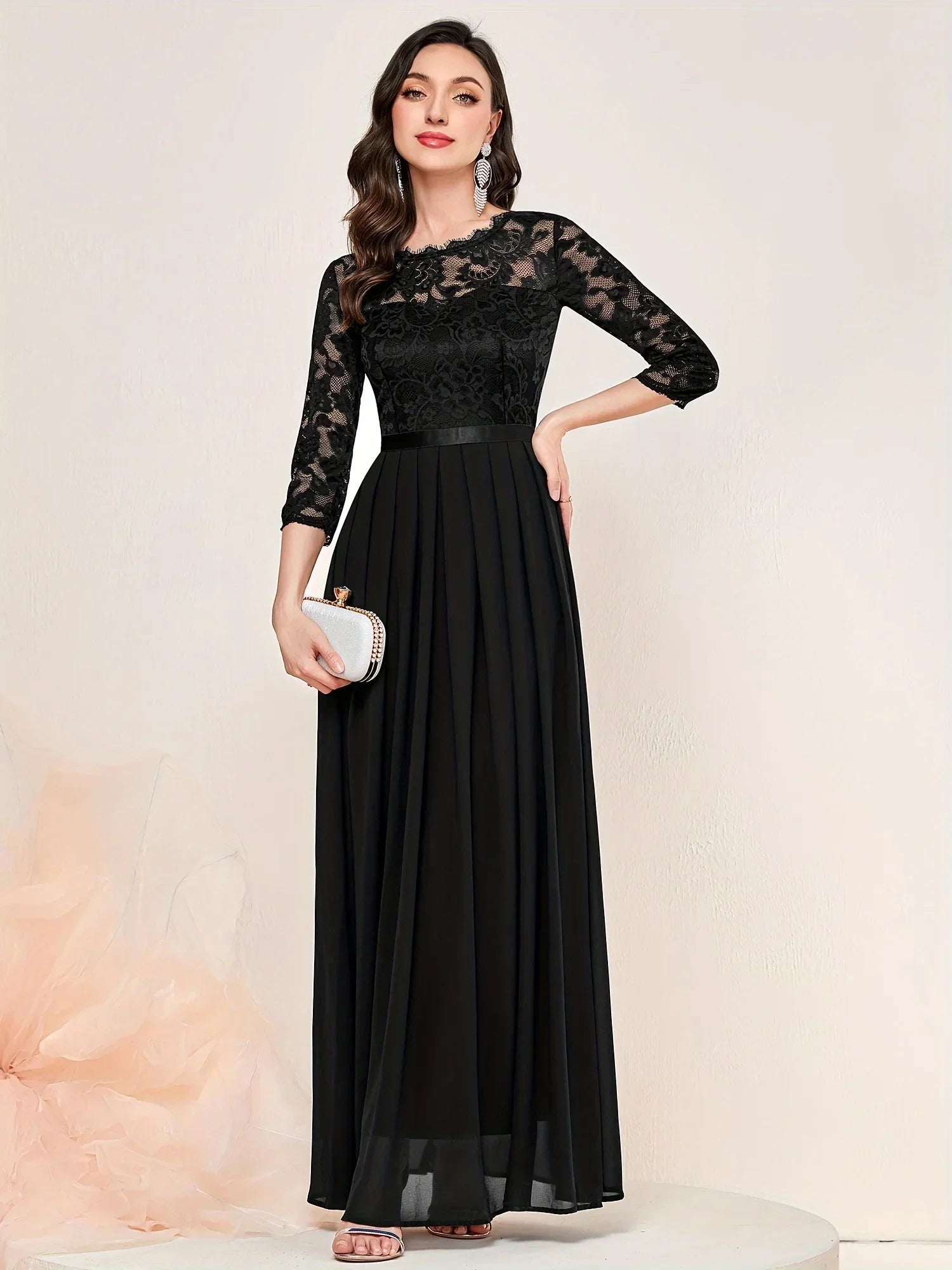 Black lace pleated formal evening dress with quarter sleeves and elegant overlay detailing