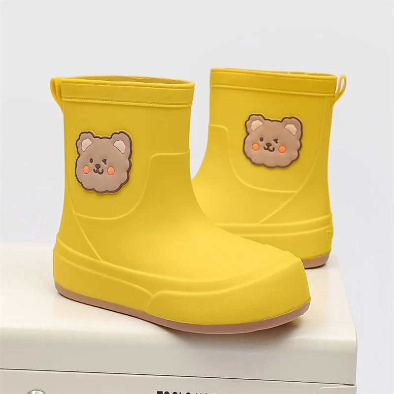 Women's ankle-length rubber rain boots in pull-on fit featuring a playful bear motif waterproof design