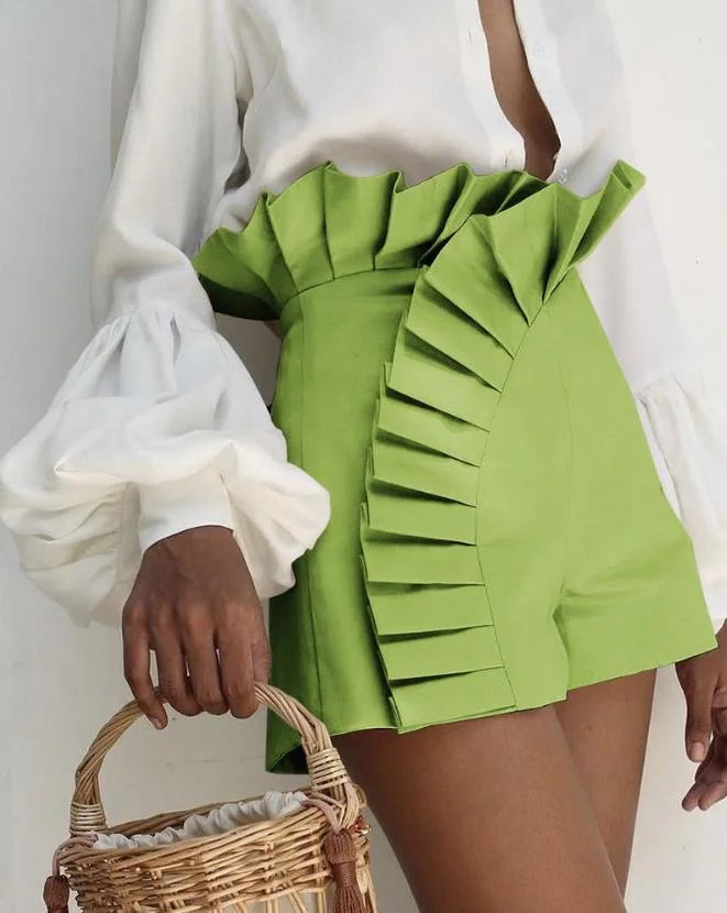Aria pleated high-waist shorts with fluid cascading ruffles for a sculpted, effortlessly flattering silhouette