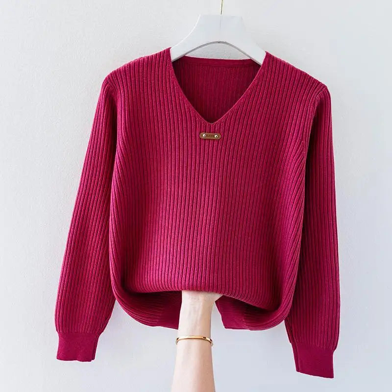 Slim-fit ribbed knit pullover top in honey with V-neckline and metal collar accent