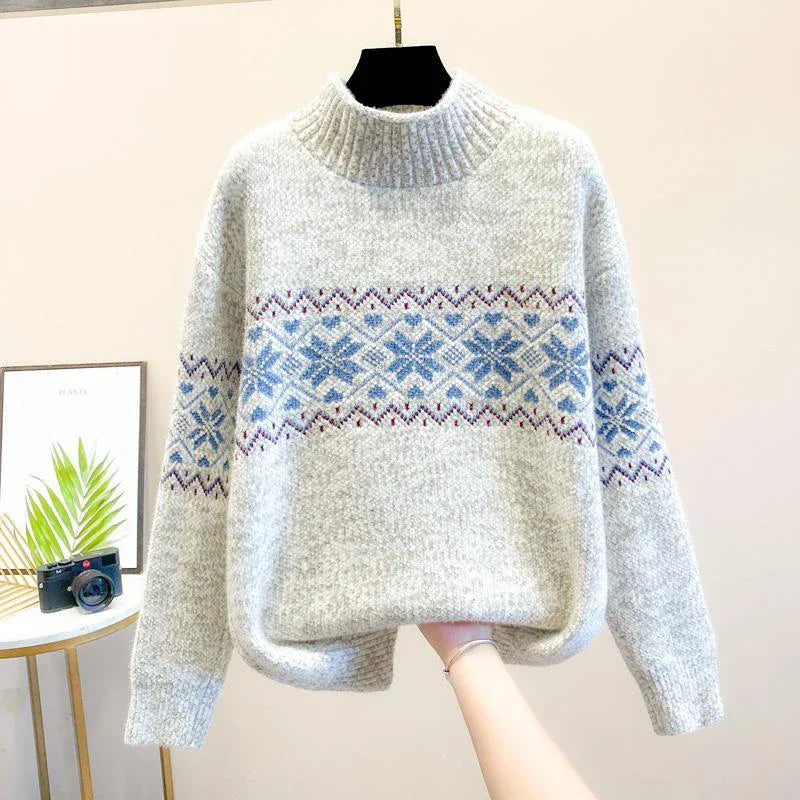 White relaxed-fit turtleneck knit sweater with intricate snowflake jacquard pattern