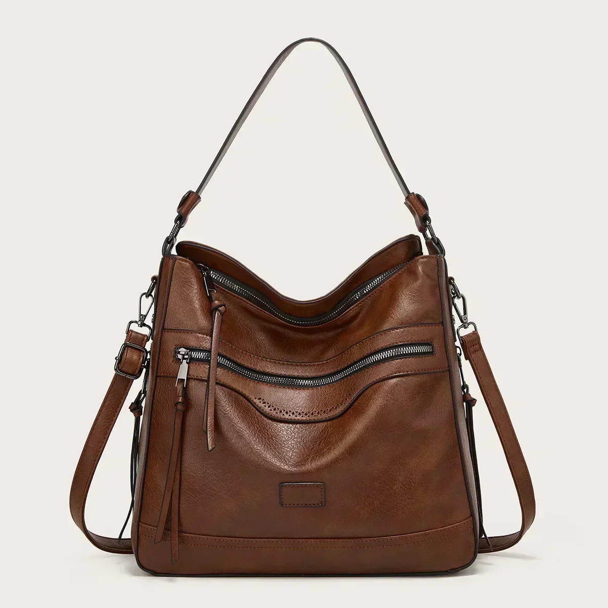 Black vegan leather slouchy hobo bag with adjustable strap and multiple zip compartments