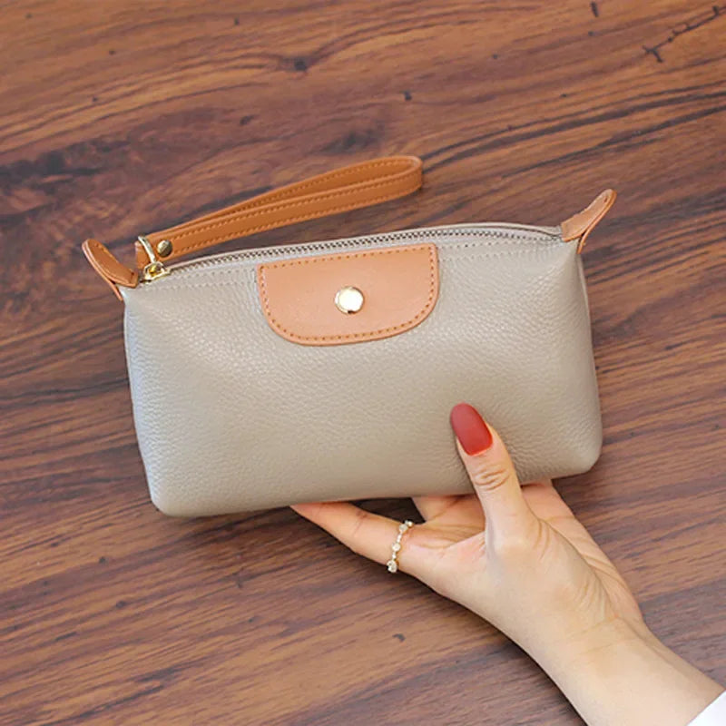 Wavlynn Anne pebbled vegan leather wristlet clutch bag with zipper closure, compact PU leather design