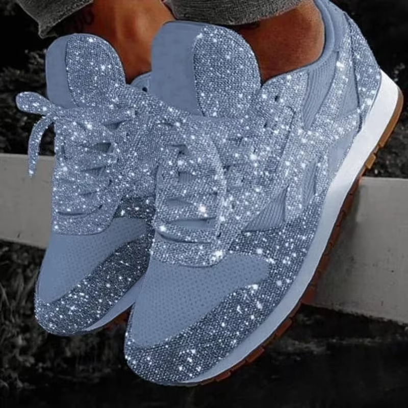 Women's silver glitter mesh platform sneakers with lace-up closure and lightweight lifted sole