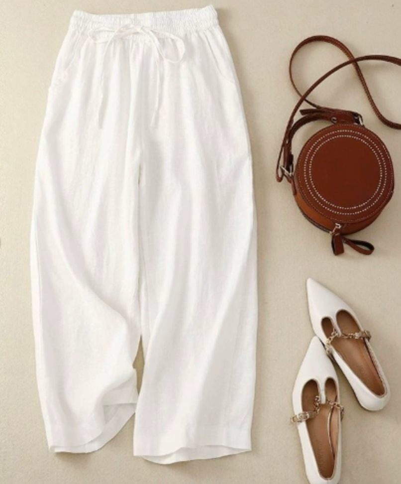 Sandra relaxed wide-leg pants in soft neutral tone with gathered elastic waistband for effortless everyday style