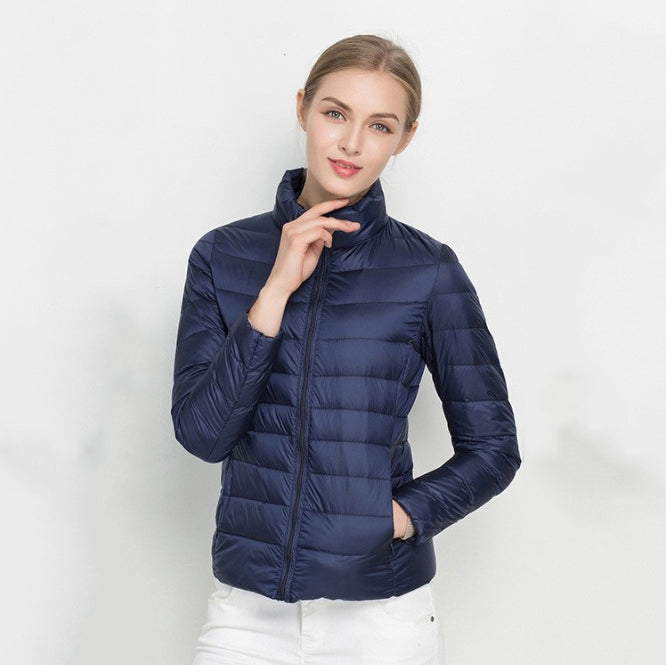 Women's slim fit quilted jacket in solid color, zip front high collar, lightweight insulated all-season design