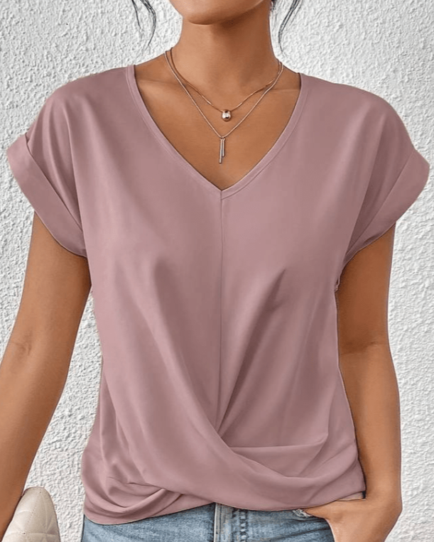 Women's jade green V-neck twist front top with gathered hem detail and cuffed cap sleeves