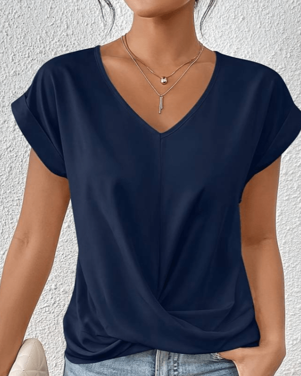 Women's jade green V-neck twist front top with gathered hem detail and cuffed cap sleeves