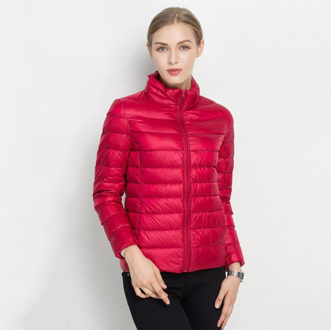 Women's slim fit quilted insulated jacket with zip front high collar, lightweight all-season style