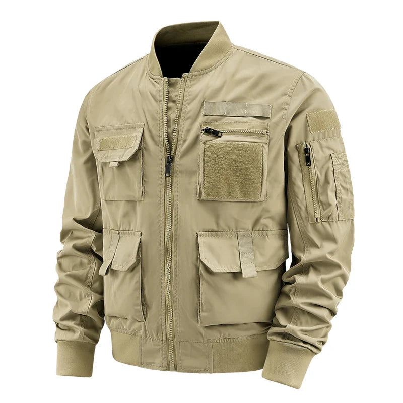 Men's olive utility jacket with multi-pocket velcro design, zippered storage, and rugged outdoor style