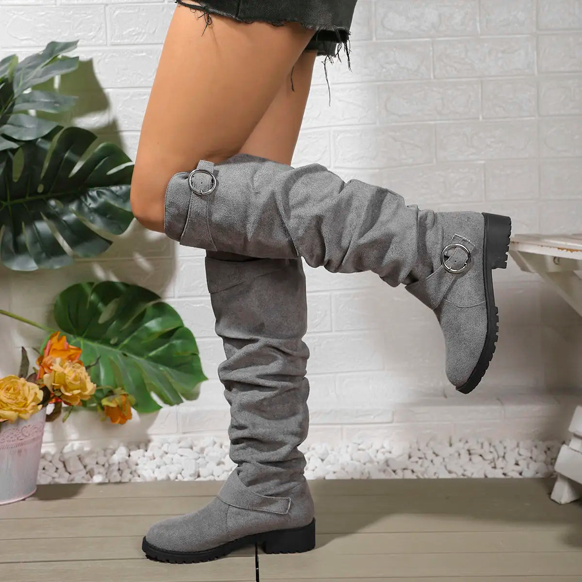 Wyn knee-high boots sleek elongated silhouette leg-lengthening design for everyday elegant style