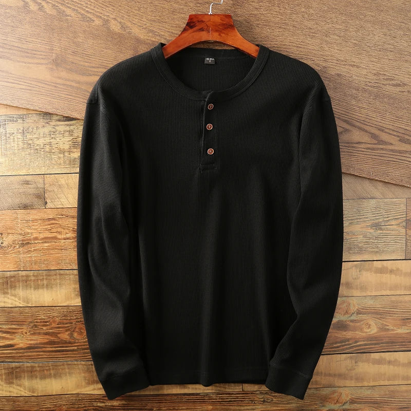 Heather gray waffle knit Henley long sleeve shirt with minimalist design and premium cotton blend fabric