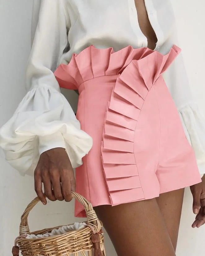 Aria pleated high-waist shorts with cascading ruffles, sculpted silhouette in soft breathable fabric