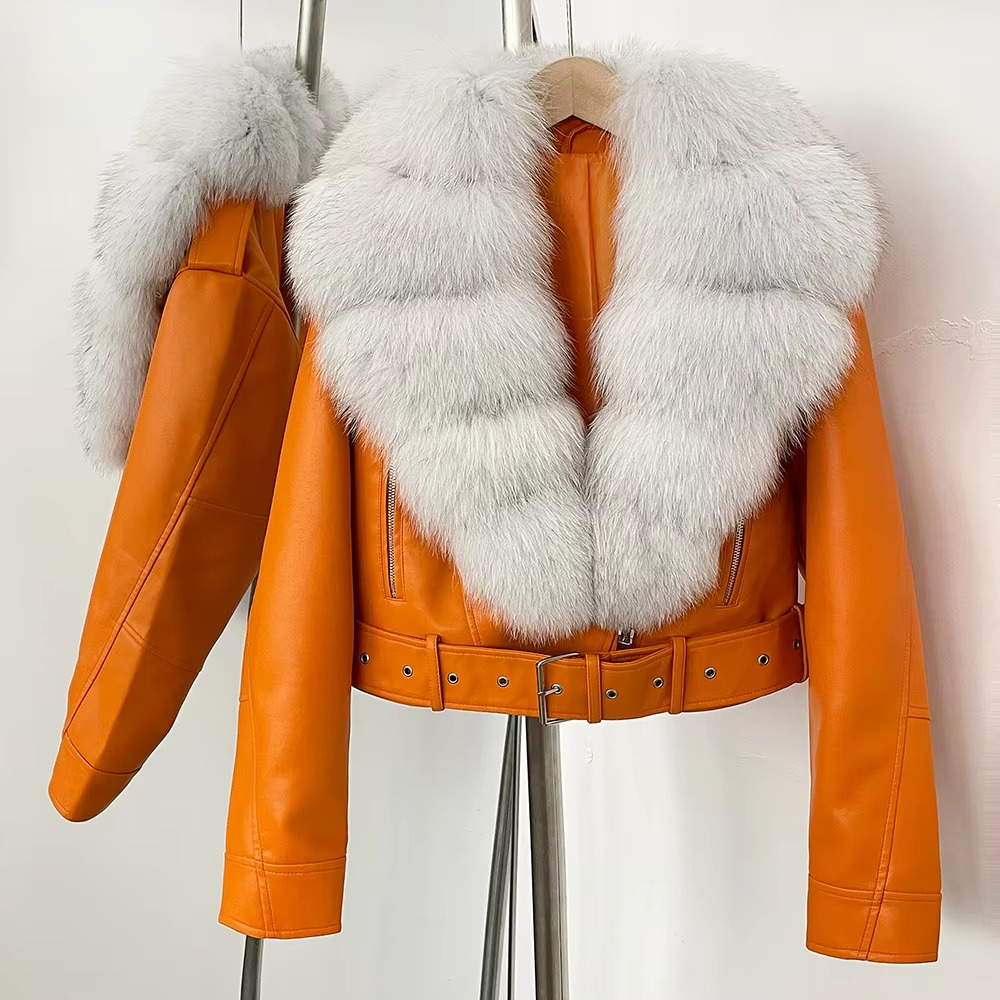 Women's black faux leather coat with plush faux fur collar, elegant long silhouette for winter
