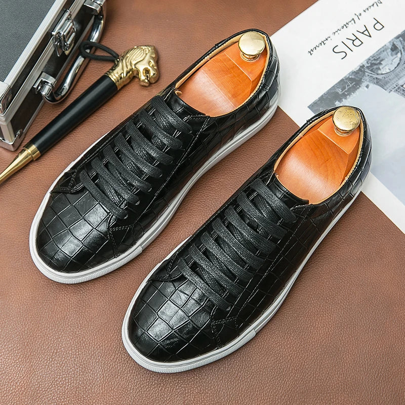 White low-top sneaker with embossed alligator synthetic leather upper and cushioned rubber outsole