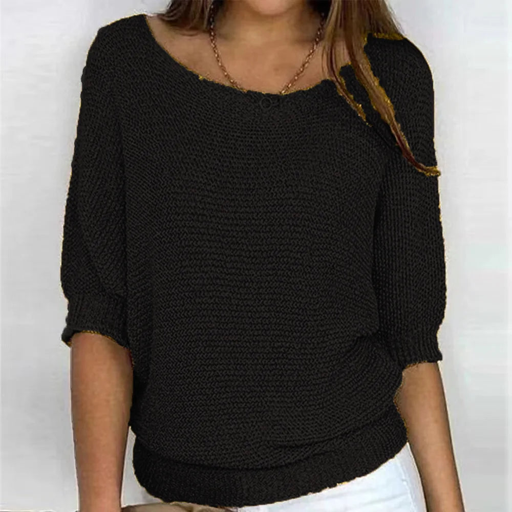 Women's loose fit round neck knit sweater in neutral tone with soft 3/4 sleeves for everyday style