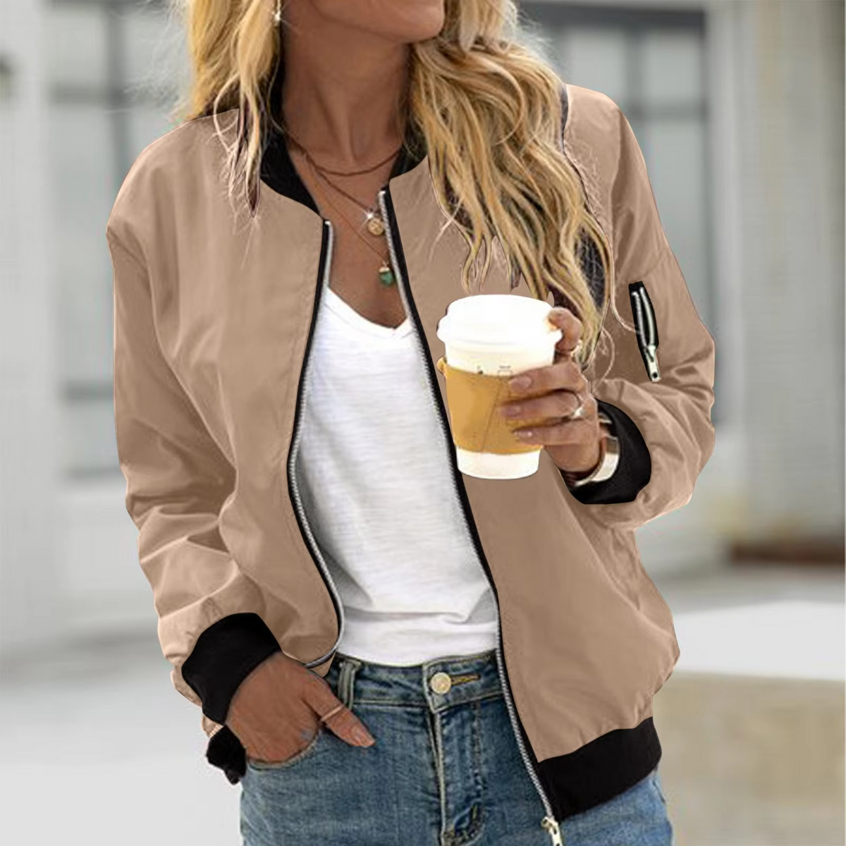 Women's lightweight mock neck bomber jacket in casual zip-up style with elevated collar for outdoor wear