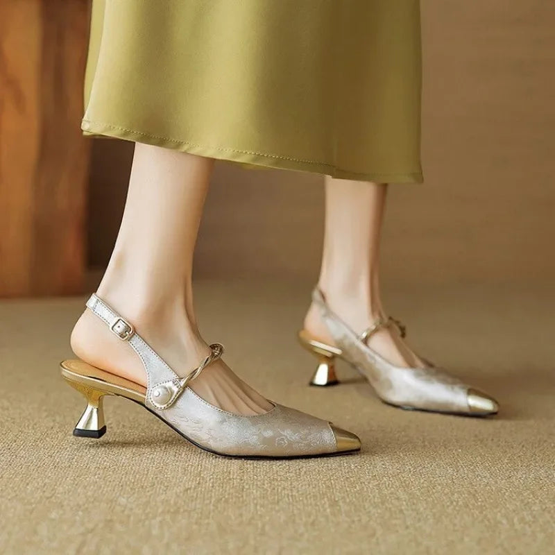 Women's ivory floral-textured slingback kitten heel pumps with pearl-embellished twisted strap