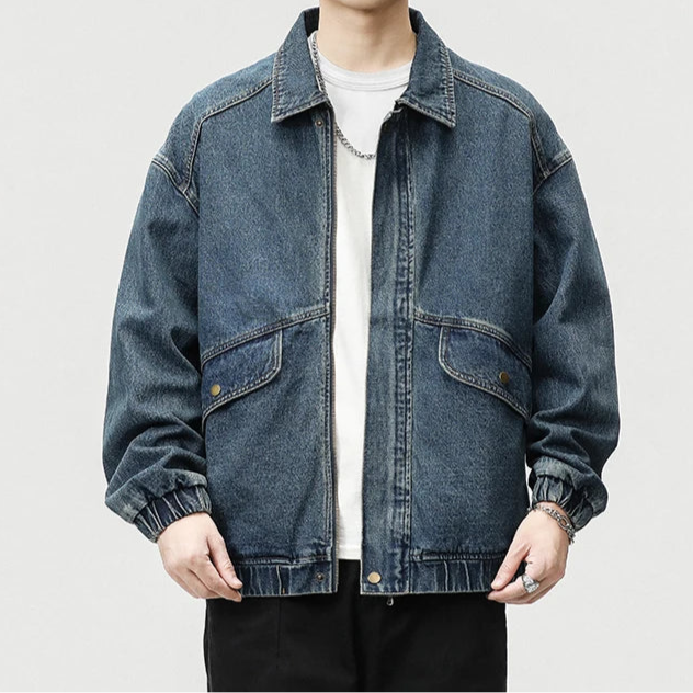 Medium wash denim jacket oversized boxy fit retro style with elastic cinched cuffs