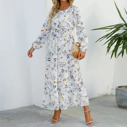 Floral maxi dress with flowing silhouette, soft tones, flattering fit for effortless elegant style