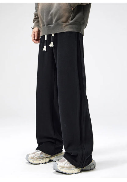 Kovalé unisex wide-leg cotton sweatpants relaxed fit with hemmed bottoms minimalist aesthetic