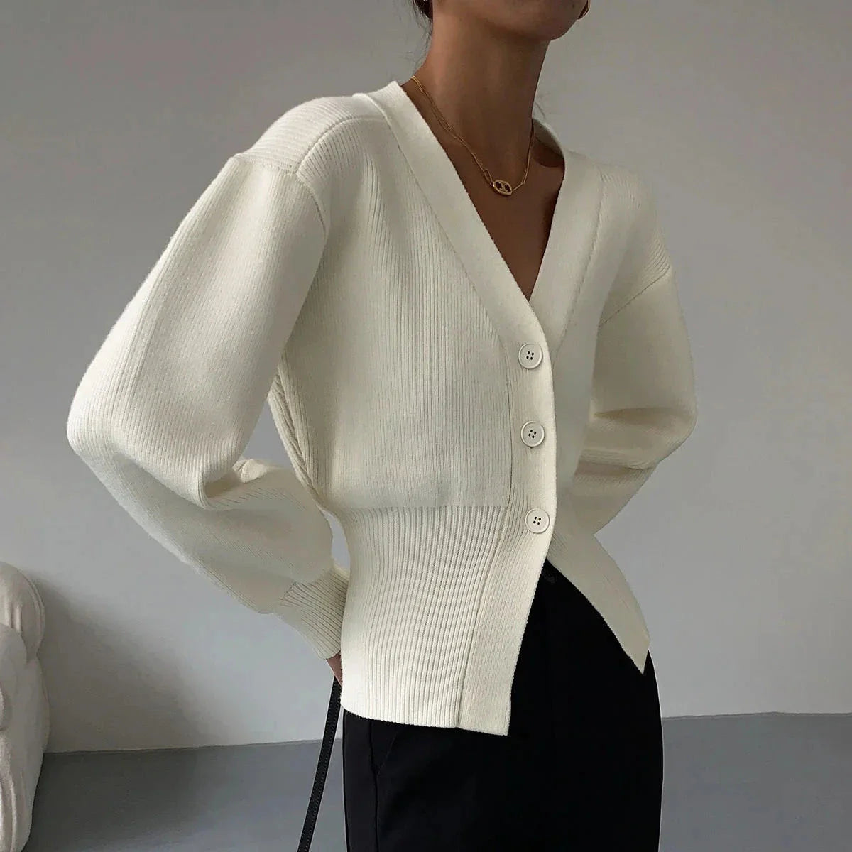 Cream ribbed knit sweater relaxed roomy sleeves tailored body casual versatile lightweight warmth
