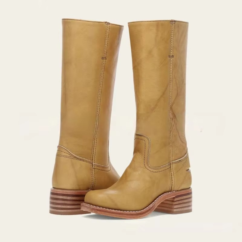 Women's black wide-calf knee-high boots with retro square heel and Western-inspired silhouette