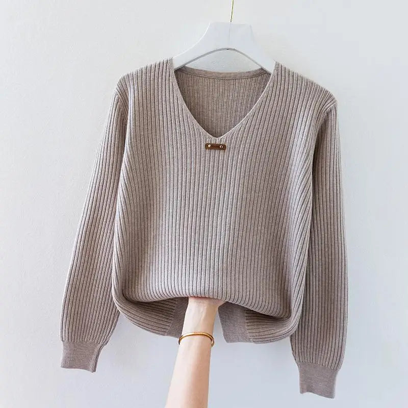 Brienna Honeyline slim-fit ribbed knit pullover top with V-neckline and metal collar accent