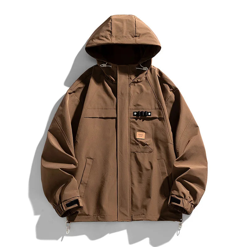Delta Ridge waterproof jacket in sleek tones with adjustable hood, velcro cuffs, and multi-pocket design