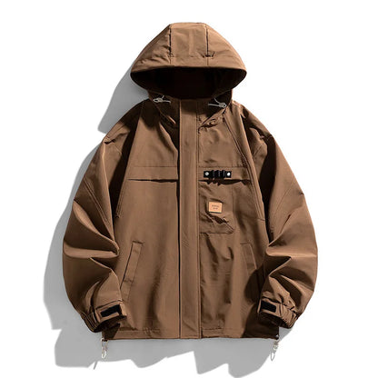 Delta Ridge waterproof jacket in sleek tones with adjustable hood, velcro cuffs, and multi-pocket design