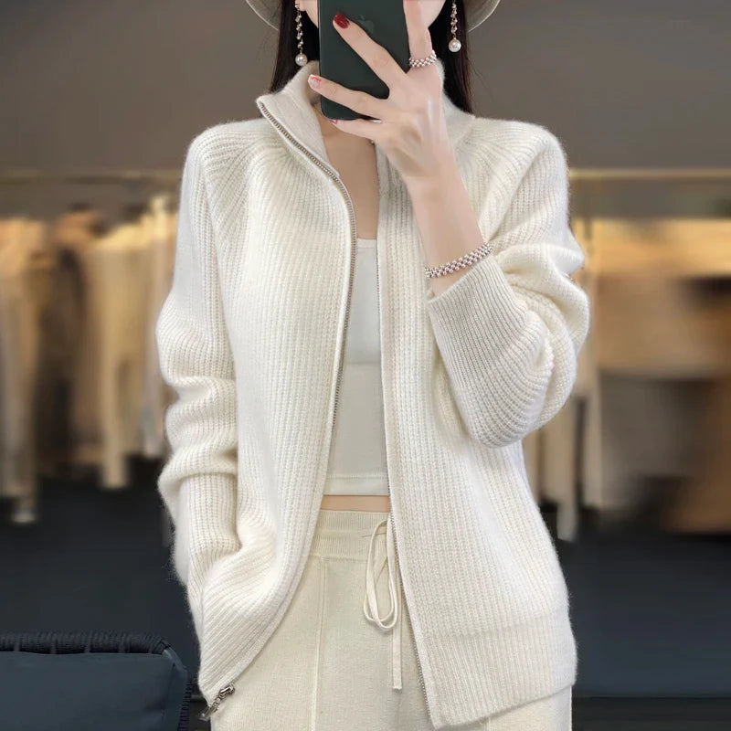 Charlotte Prestige ivory wool zip-up sweater with padded shoulders and sleek zipper closure