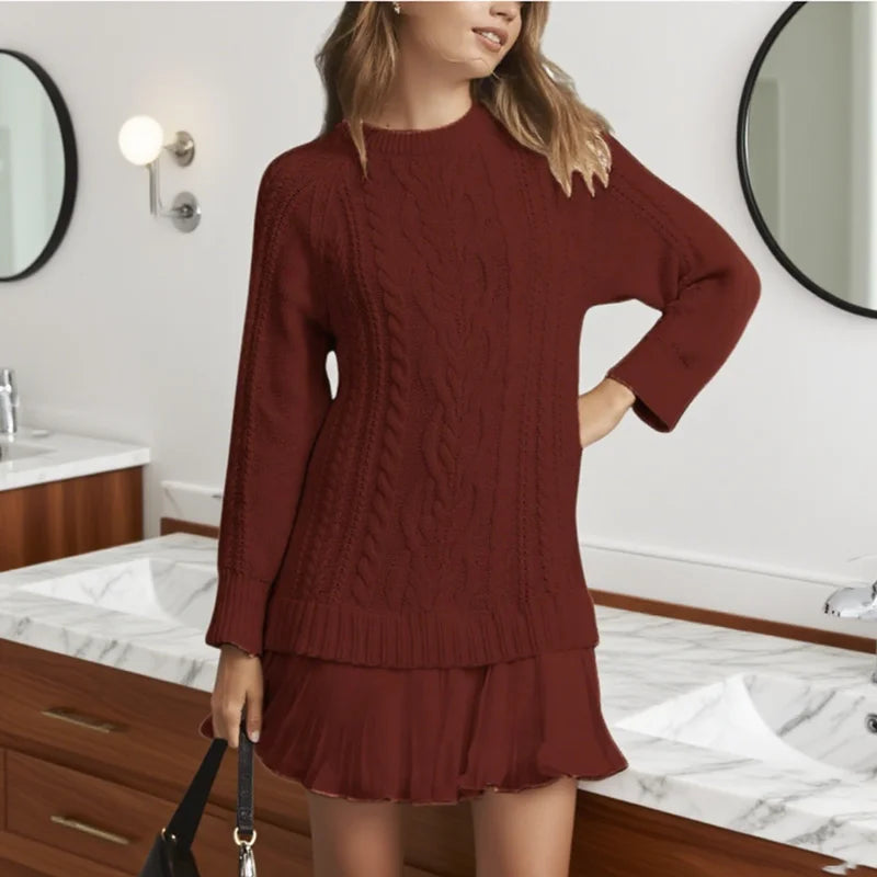 Cream knit sweater dress with flattering silhouette and distinctive modern design details