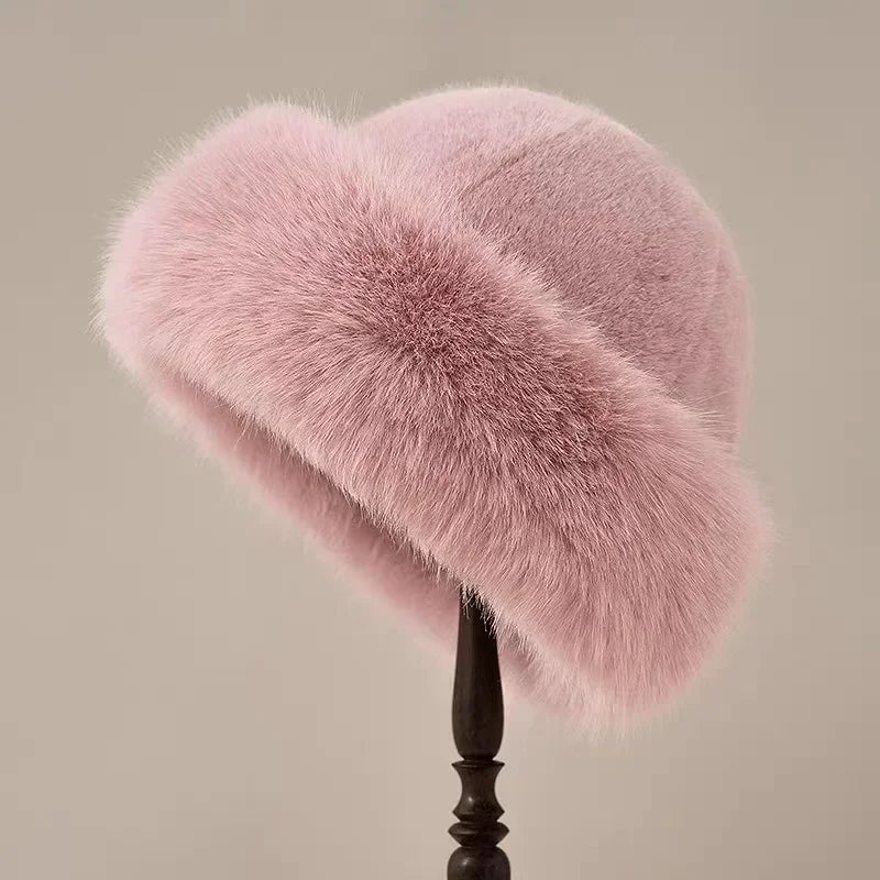 Ivory rounded silhouette fur hat with plush furry texture, classic winter style for elegant cold-weather looks