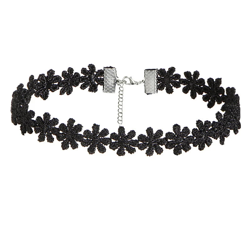 Gothic black velvet choker necklace with intricate lacework and bold pendant, adjustable closure