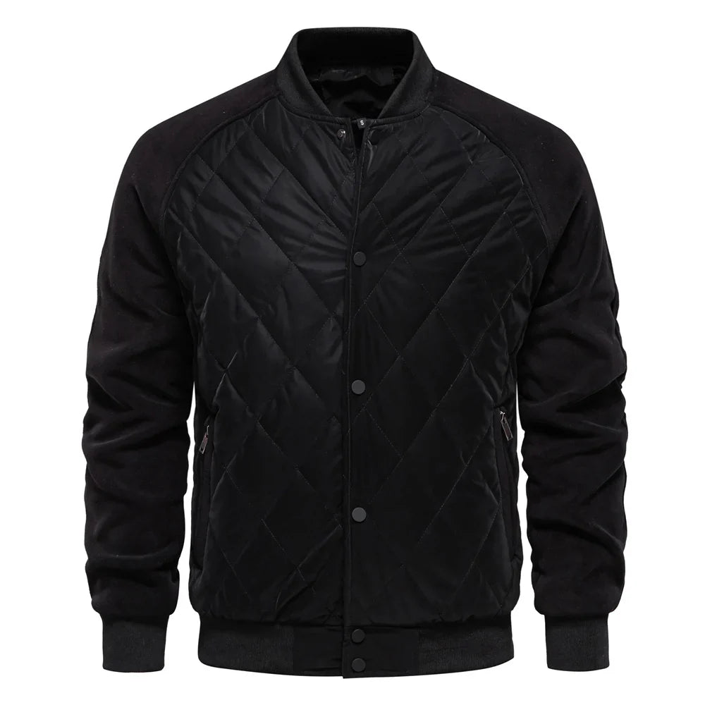 Navy quilted bomber jacket with suede-texture sleeves, diamond-quilted front, and ribbed trim