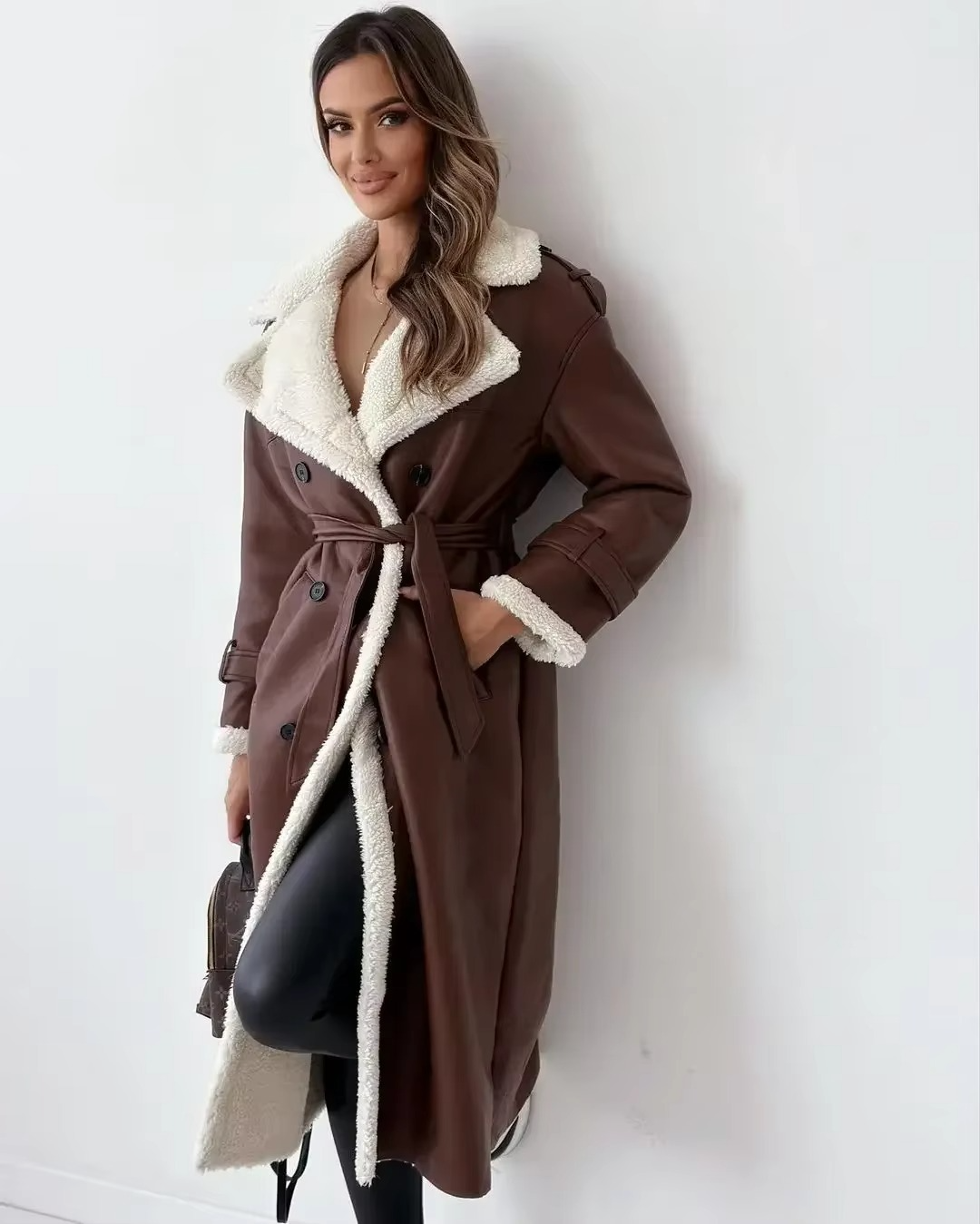 Women's black PU leather double-breasted trench coat with stand collar and warm plush lining