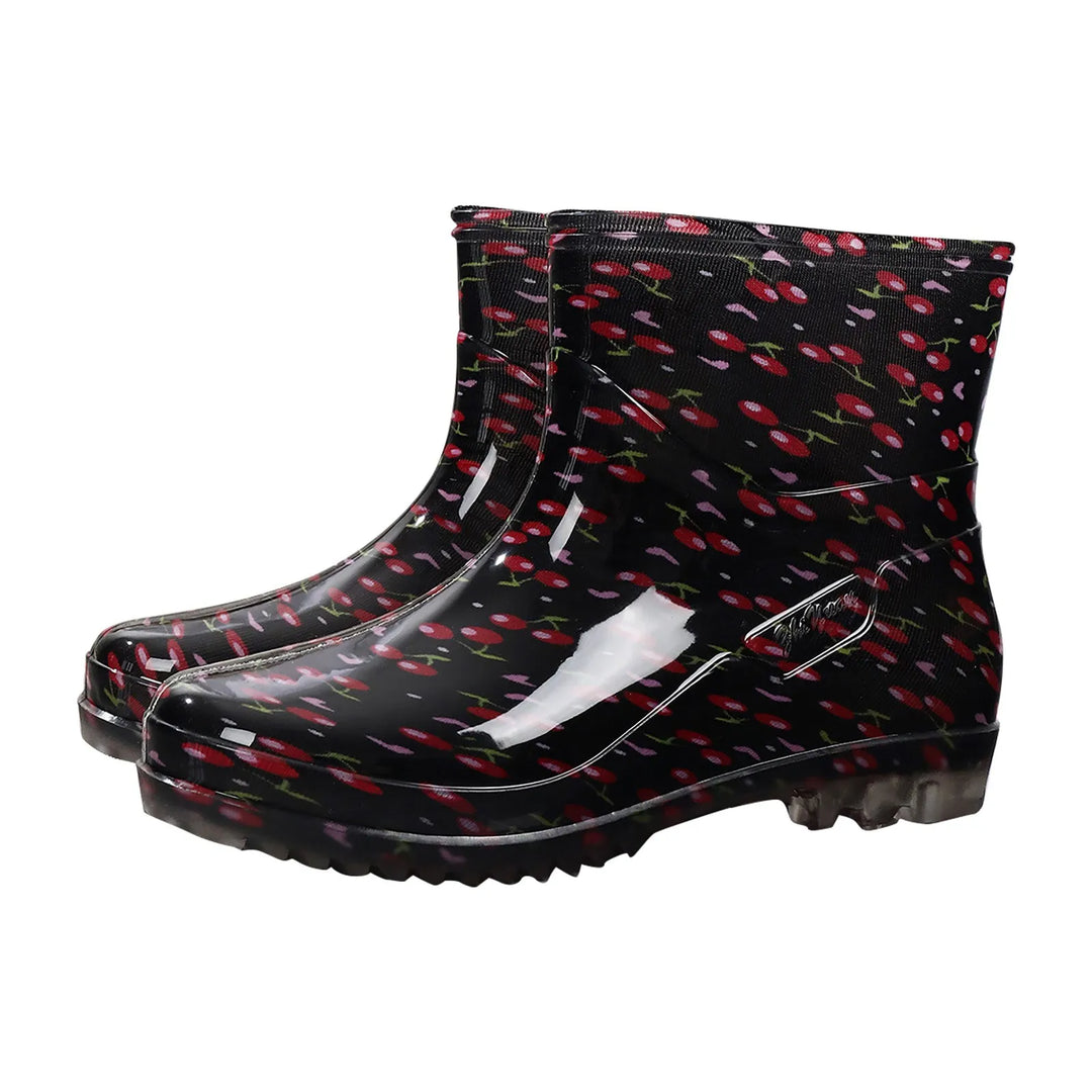 Women's waterproof rubber Wellington boots slip-on mid-calf style with outdoor grip sole for rainy days