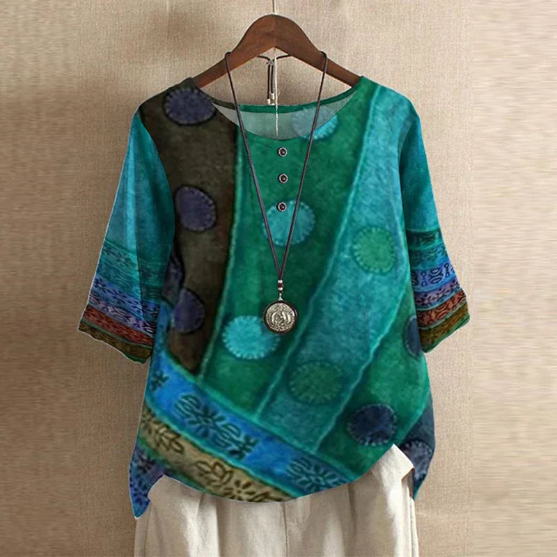 Vintage floral blouse relaxed fit retro-inspired design in soft muted tones for effortless everyday elegance