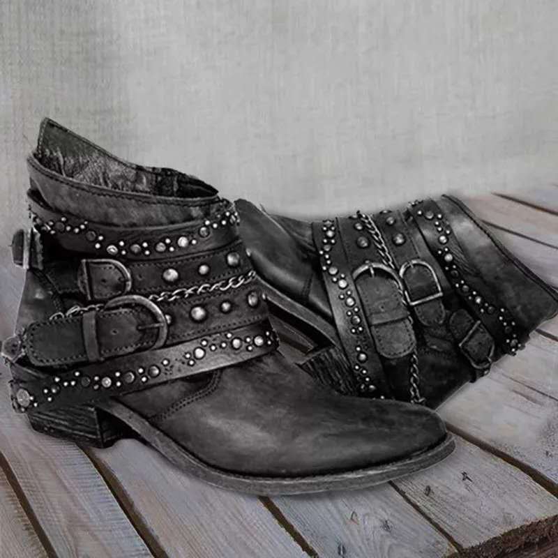 Women's brown PU leather western ankle boots with low heel, buckle and chain details