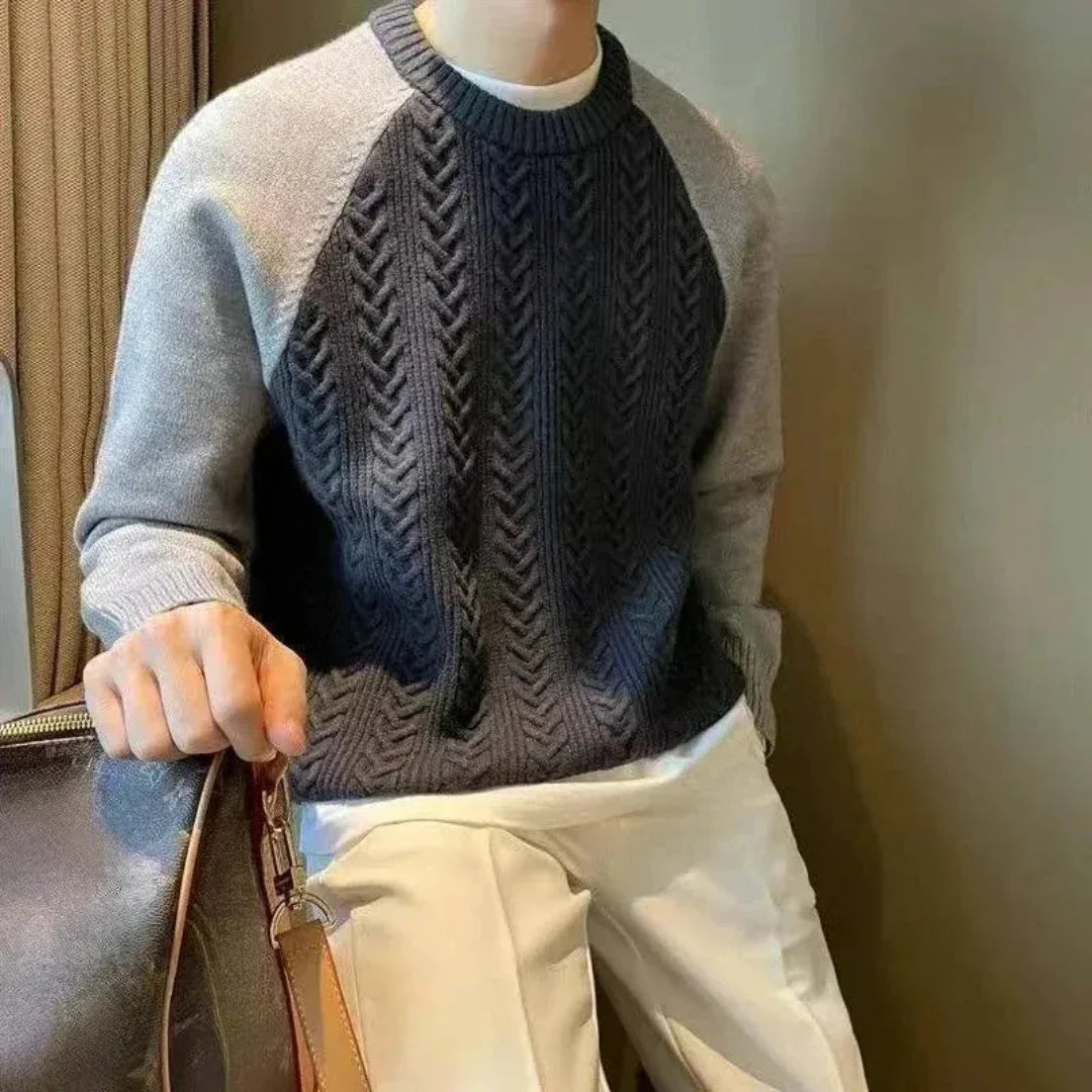 Cream cable-knit wool blend sweater with contrasting raglan sleeves and ribbed cuffs for smart-casual style