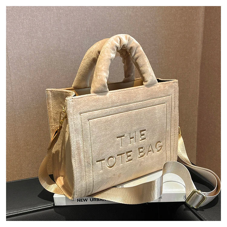 Soft velour square tote bag with original letter print, spacious interior, and optional strap