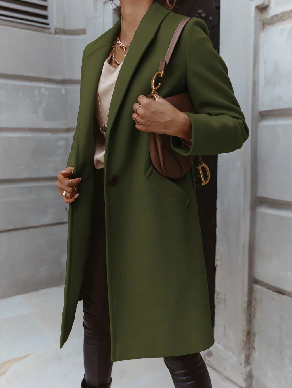Women's double-breasted longline coat structured silhouette versatile styling warm refined layering essential